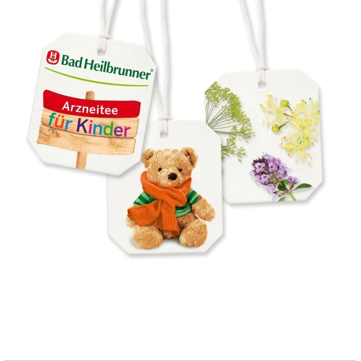 bio organic children herbal tea closeup tea bag tags, brand logo, teddy bear, flower